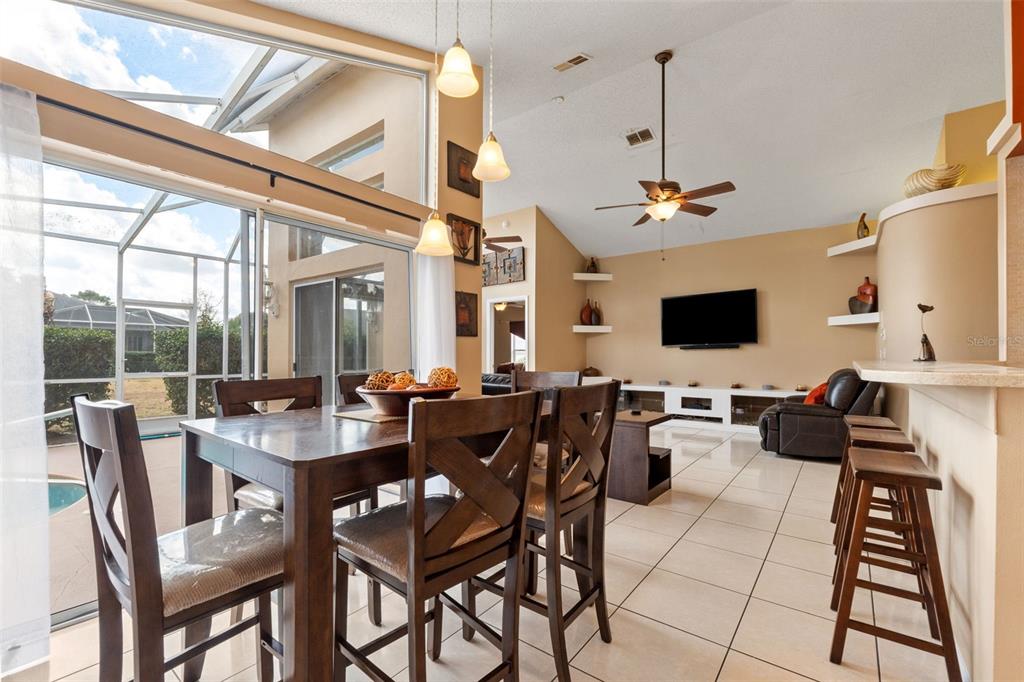 14122 Newcastle Avenue Spring Hill, FL 34609 - Photo 3 of 66 a view of a dining room with furniture window and outside view