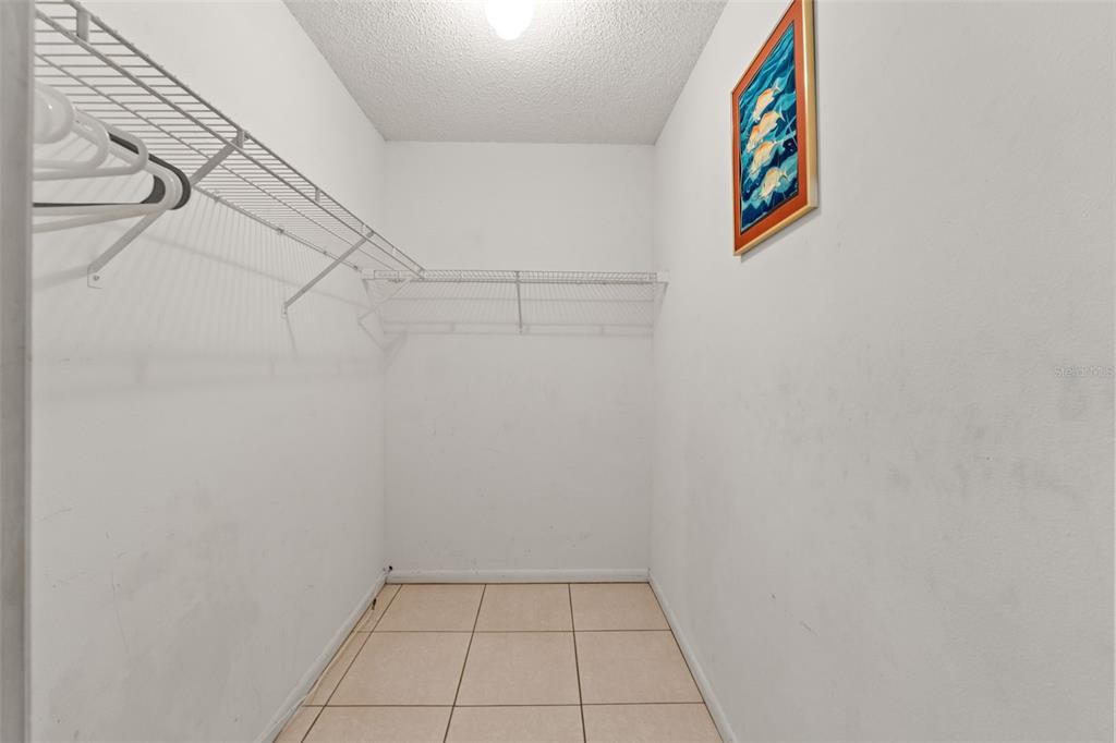 14122 Newcastle Avenue Spring Hill, FL 34609 - Photo 34 of 66 a view of utility room with racks on the wall
