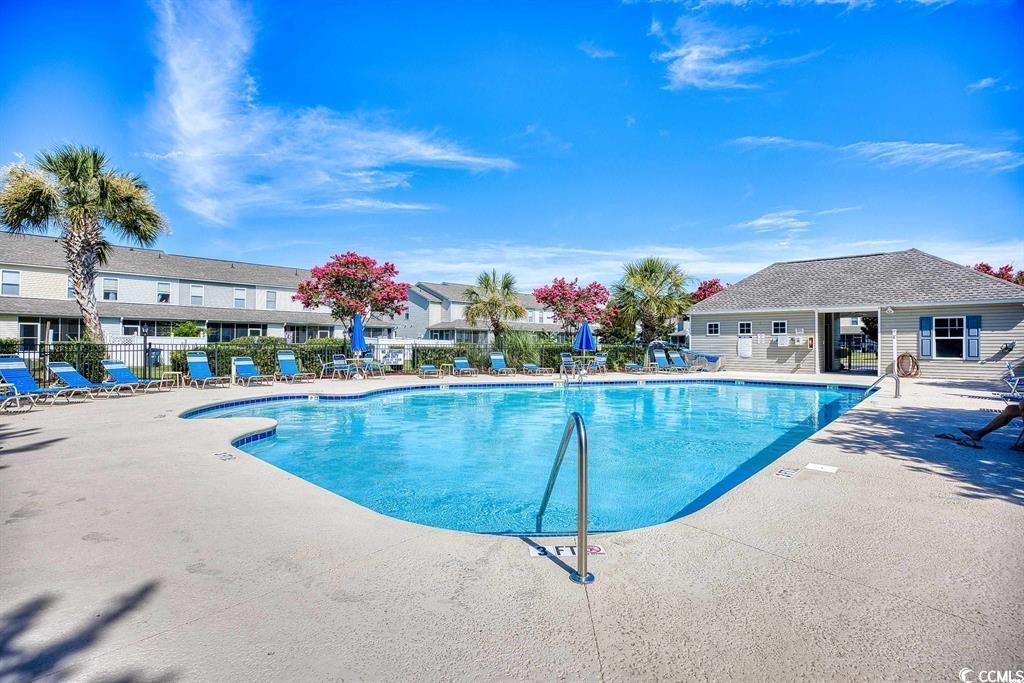161 Olde Towne Way Myrtle Beach, SC 29588 - Photo 24 of 25 Community pool featuring a patio area