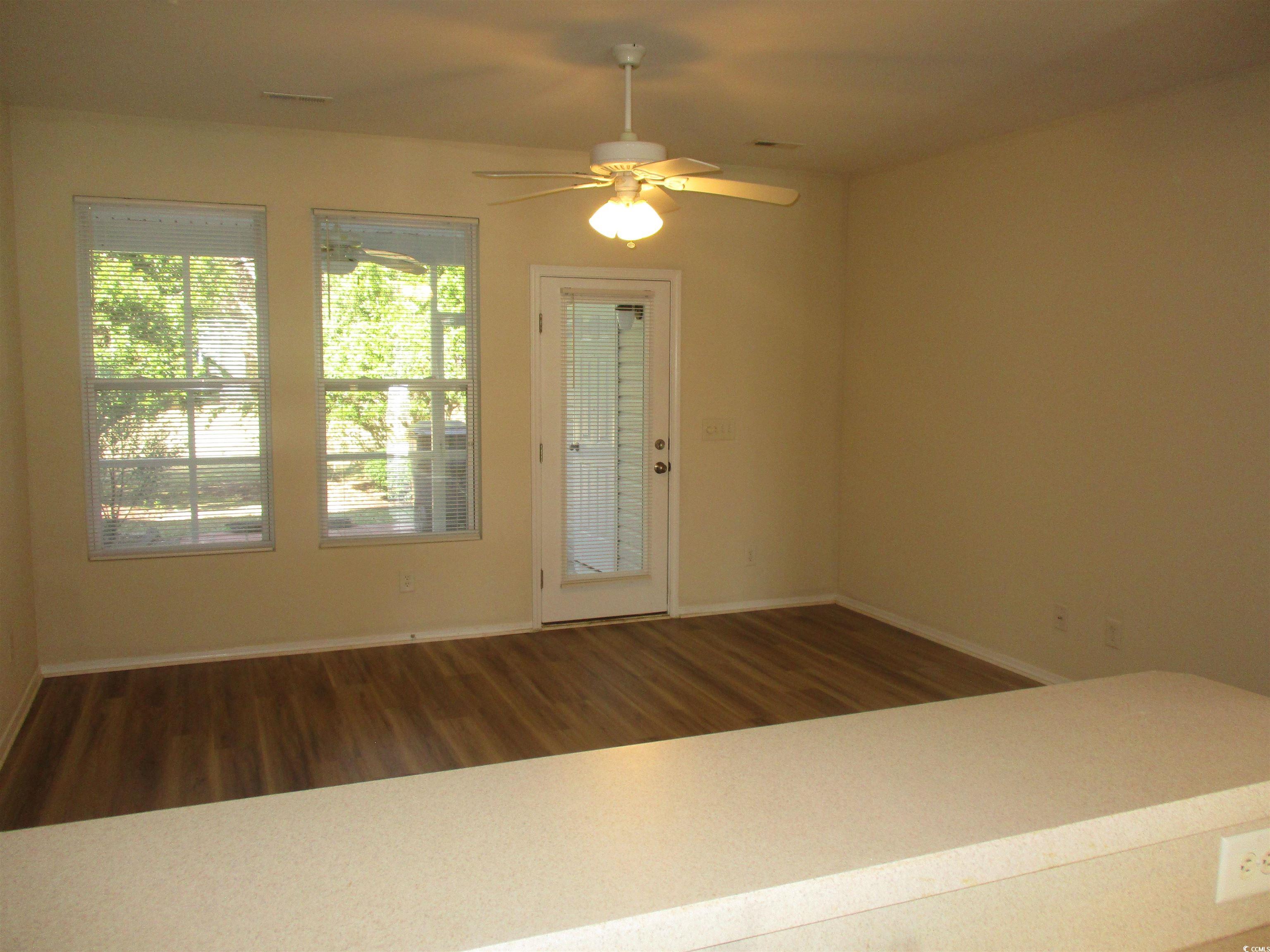 161 Olde Towne Way Myrtle Beach, SC 29588 - Photo 5 of 25 Doorway featuring wood finished floors and ceiling fan