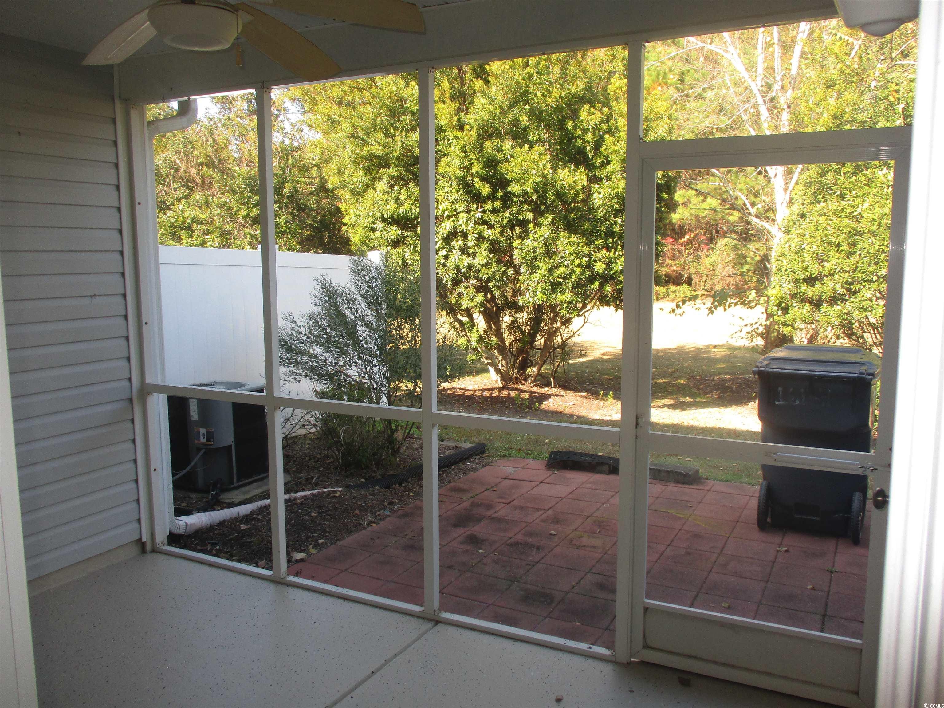 161 Olde Towne Way Myrtle Beach, SC 29588 - Photo 7 of 25 Unfurnished sunroom featuring ceiling fan