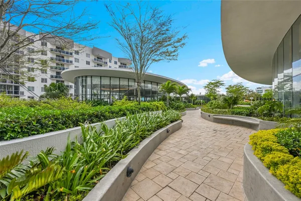 a view of a garden with a fountain