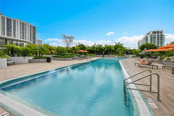 a view of a swimming pool with a patio