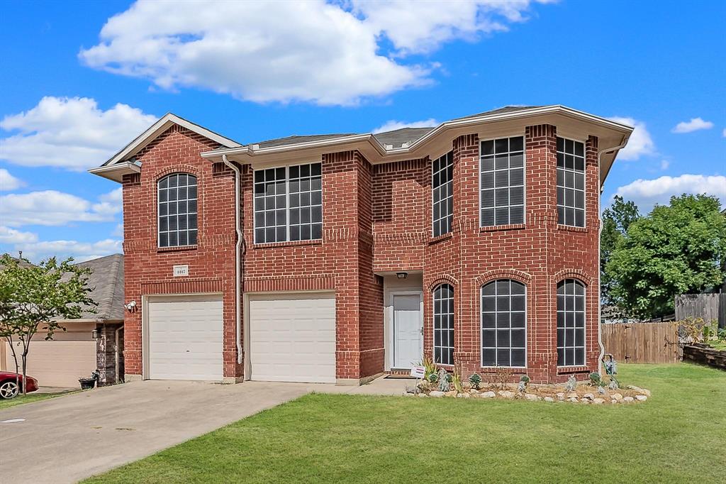 front view of house with a yard