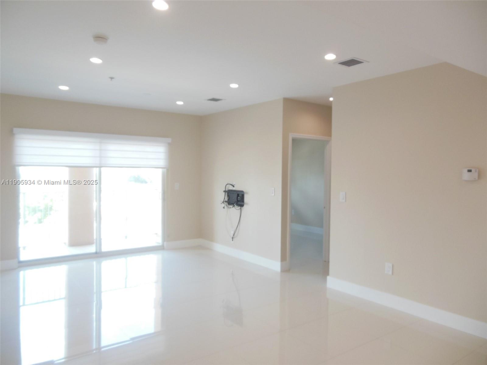 2280 Southwest 32nd Avenue, Unit 406 Miami, FL 33145 - Photo 2 of 8 a view of an empty room