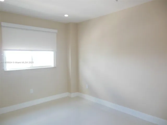 a bathroom with a shower a sink a toilet and mirror