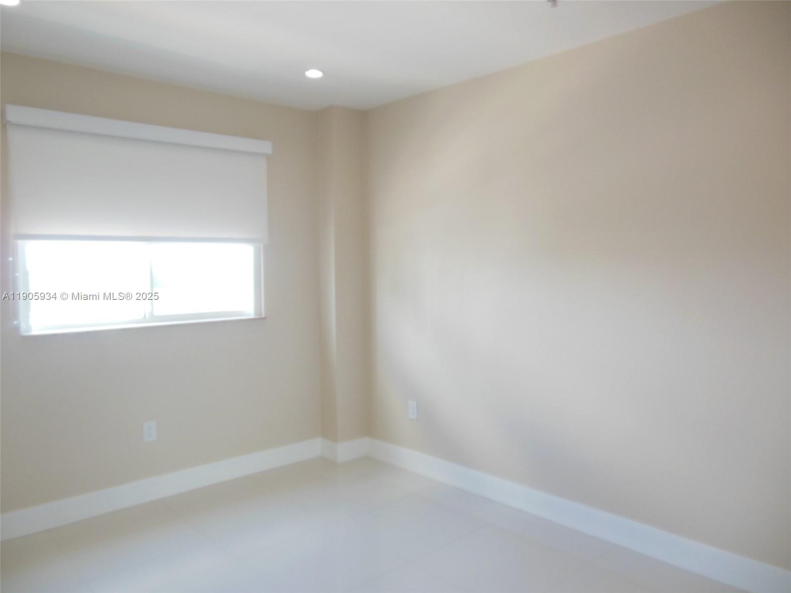 2280 Southwest 32nd Avenue, Unit 406 Miami, FL 33145 - Photo 7 of 8 a view of an empty room