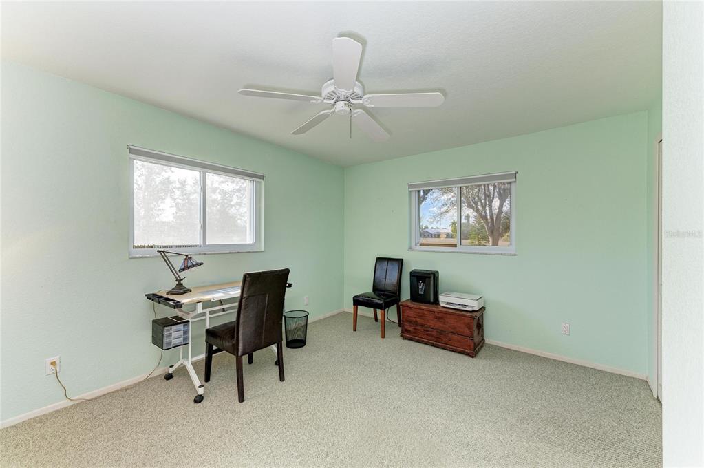 258 Surinam Street Punta Gorda, FL 33983 - Photo 25 of 47 a living room with furniture and a window