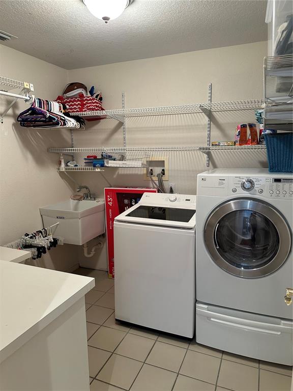 258 Surinam Street Punta Gorda, FL 33983 - Photo 30 of 47 a utility room with dryer and washer