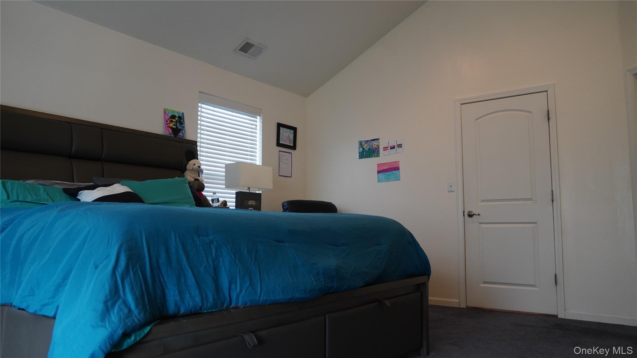 1402 Hawthorn Way New Windsor, NY 12553 - Photo 16 of 25 a bedroom with a bed and a window