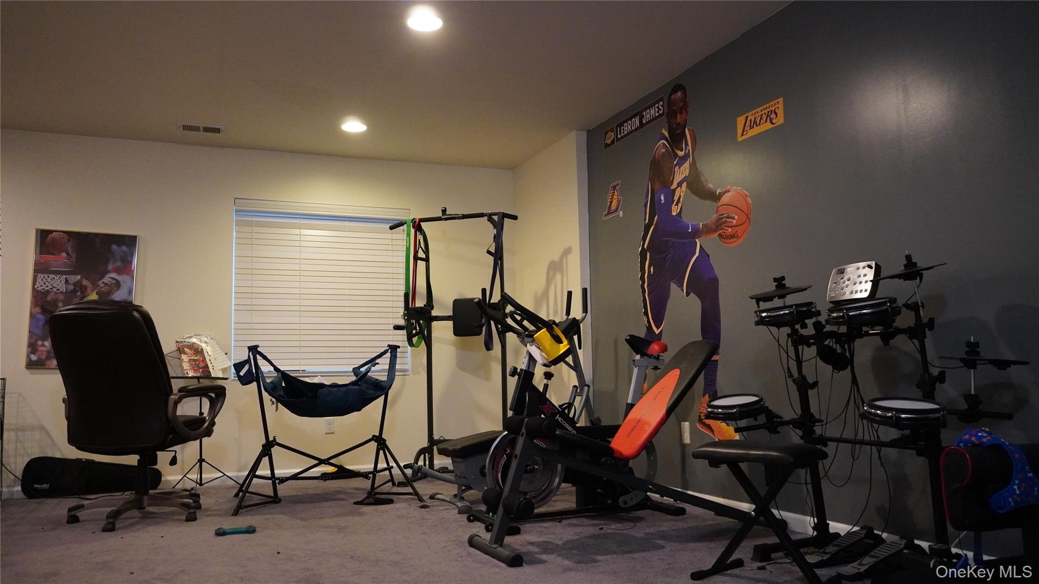 1402 Hawthorn Way New Windsor, NY 12553 - Photo 22 of 25 a view of a room with gym equipment