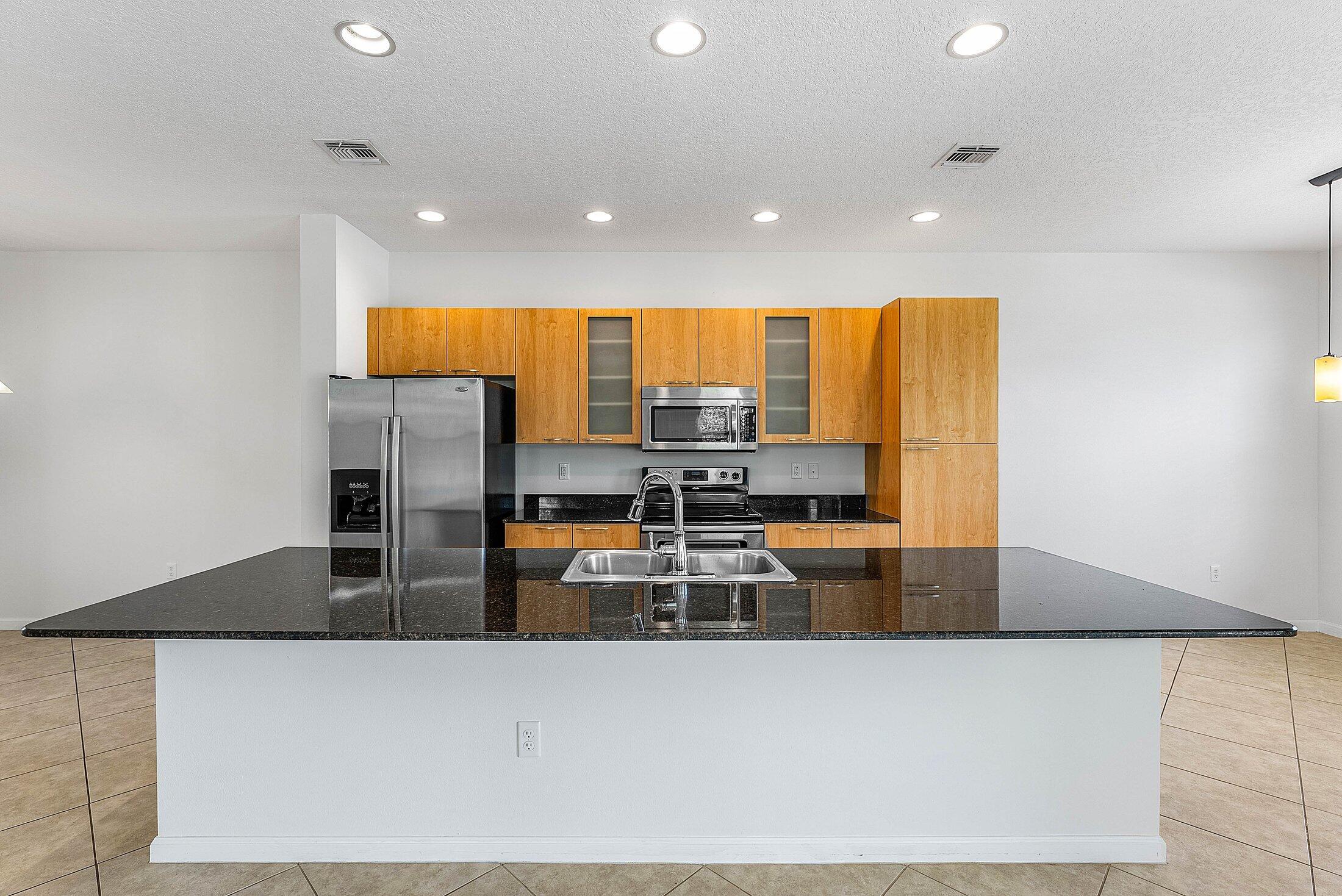 1570 Northwest 48th Place Boca Raton, FL 33431 - Photo 14 of 41 011-1570Northwest48thDrive-BocaRaton-FL-