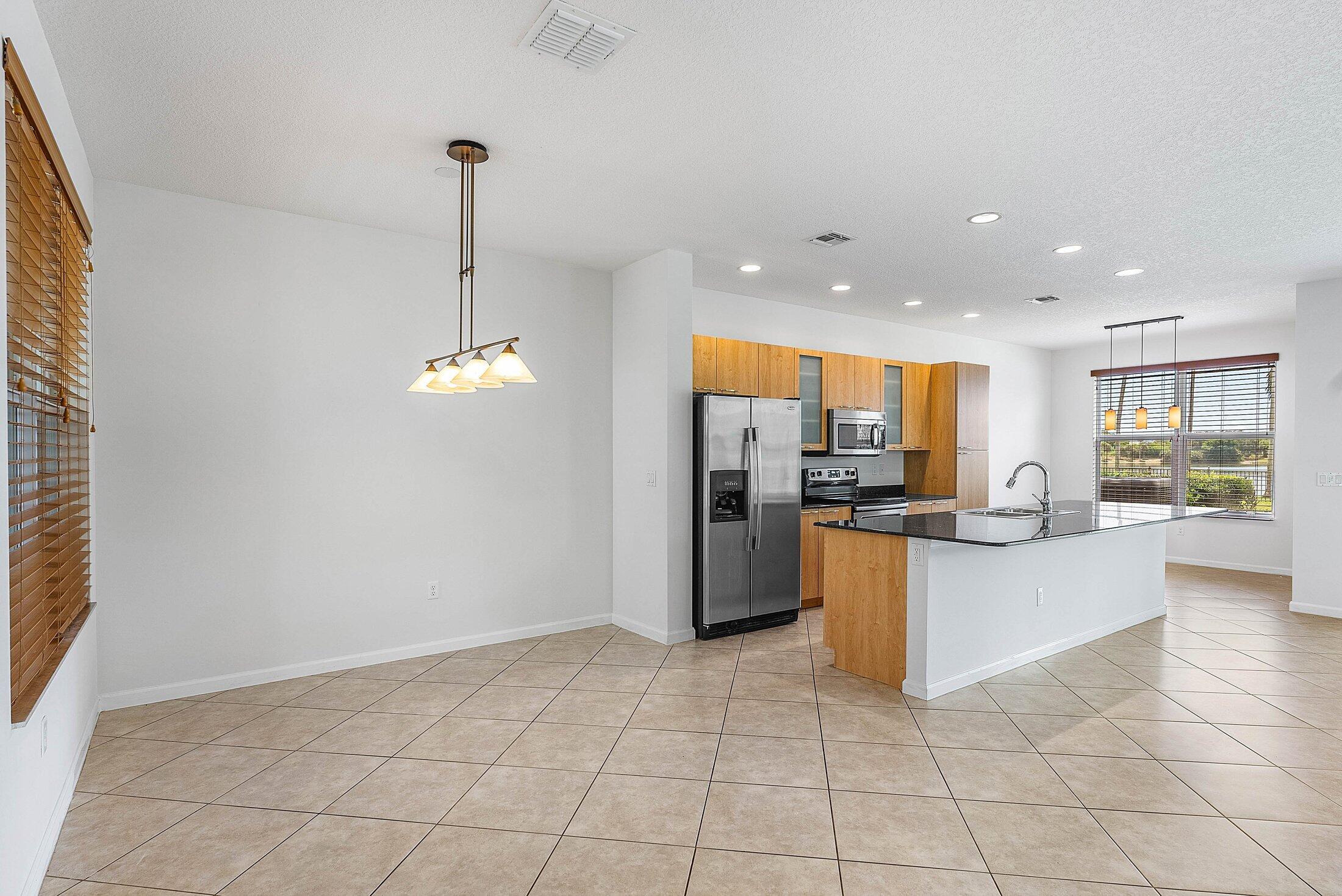 1570 Northwest 48th Place Boca Raton, FL 33431 - Photo 9 of 41 007-1570Northwest48thDrive-BocaRaton-FL-