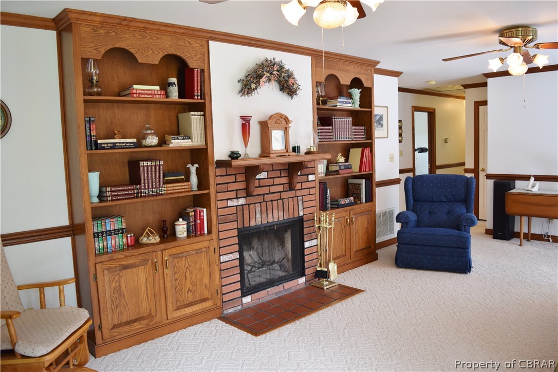 2907 Decatur Drive Hayes, VA 23072 - Photo 14 of 27 Beautiful built-ins with wood burning fireplace.