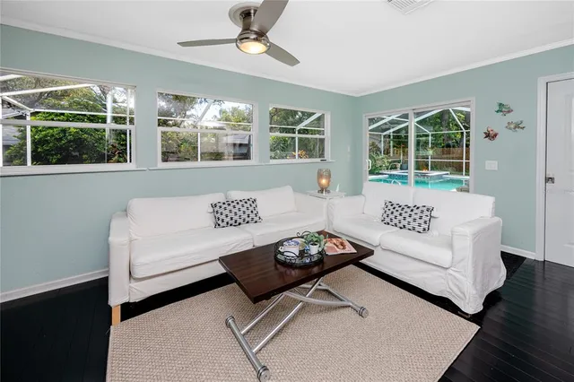 a bathroom with a sink a mirror a toilet and a shower