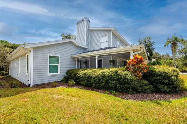 a kitchen with stainless steel appliances white cabinets and a sink
