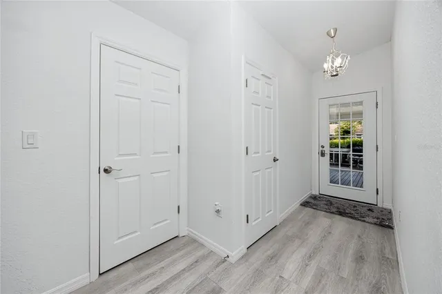 a bathroom with a double vanity sink toilet and a mirror