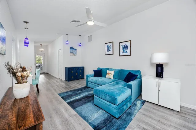 a kitchen with a sink and large window