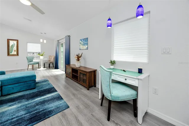a view of a hallway with washer and dryer