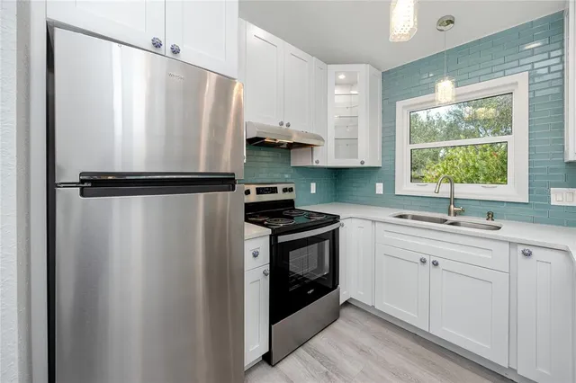 a bedroom with a bed and a mirror