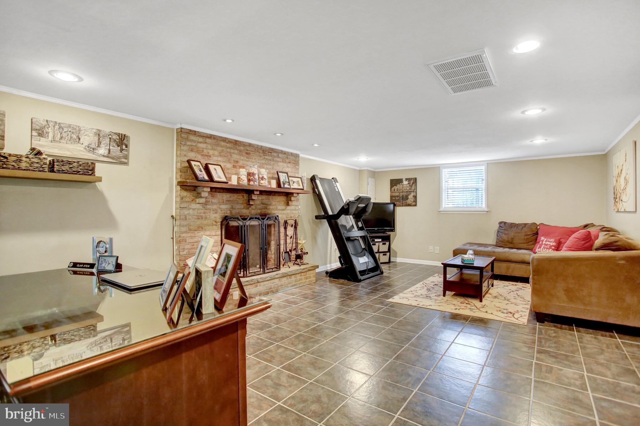687 Amosite Road Elizabethtown, PA 17022 - Photo 16 of 29 FR w/ brick fireplace w/ gas insert