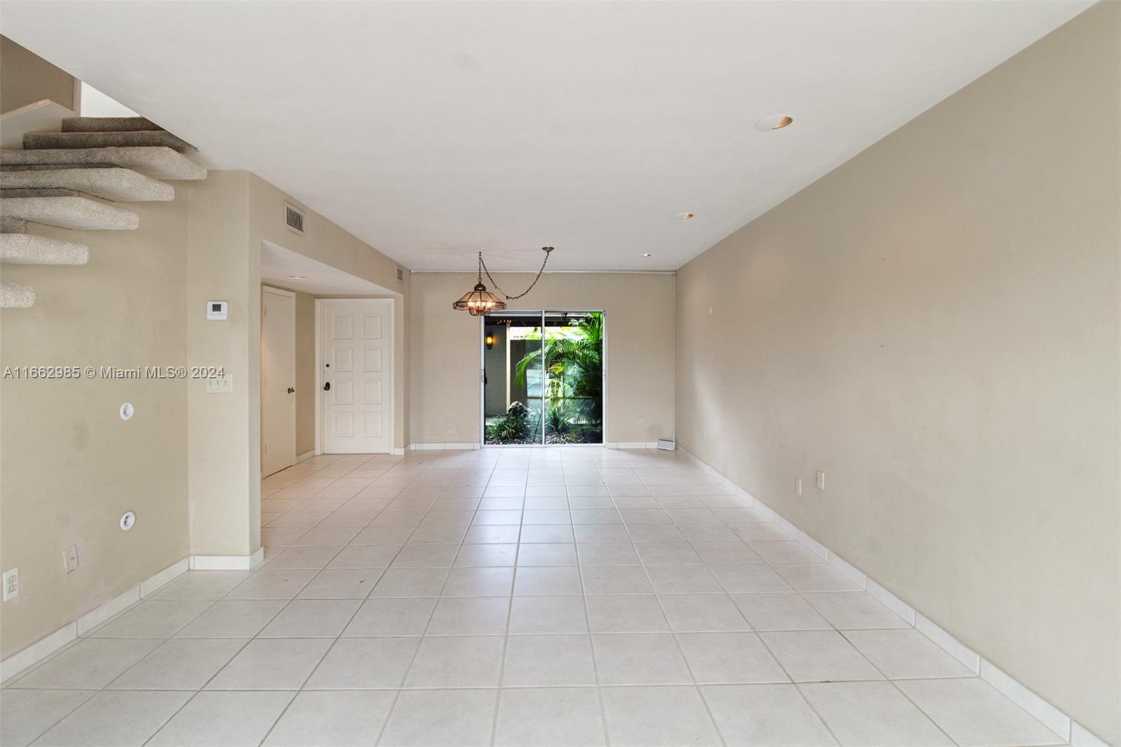7238 Jacaranda Lane Miami Lakes, FL 33014 - Photo 10 of 21 LIVING DINING AREA