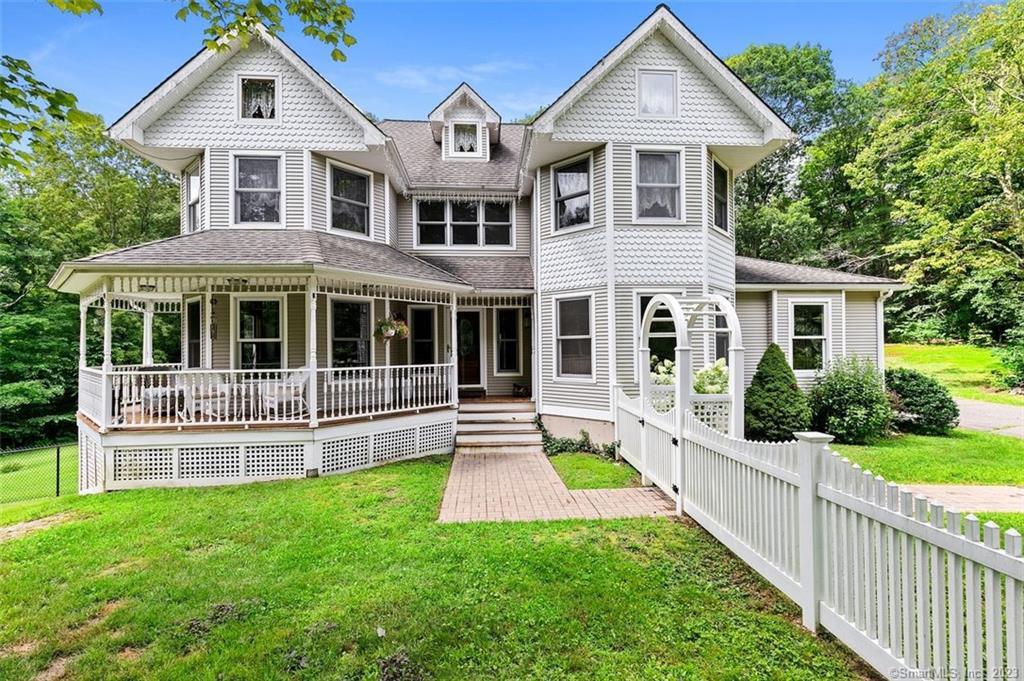 295 Ramstein Road New Hartford, CT 06057 - Photo 1 of 1 a front view of a house with a yard and porch