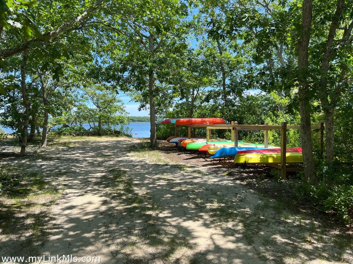 4 Jacob's Neck Road Edgartown, MA 02539 - Photo 20 of 20 a view of a house with a yard and sitting area