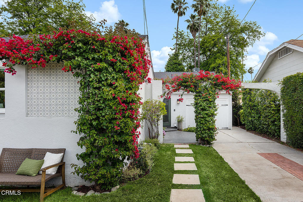 2040 North Madison Avenue Altadena, CA 91001 - Photo 2 of 35 a view of a garden with flowers and flowers