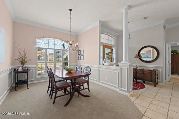 a kitchen with stainless steel appliances granite countertop a stove a sink dishwasher and a refrigerator