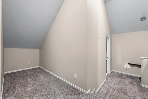 a bathroom with a tub and shower