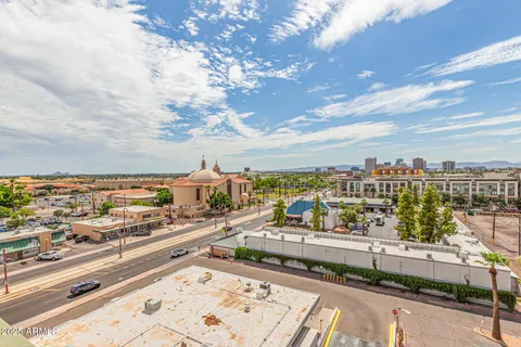 a view of a balcony with city view