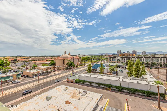 a view of a balcony with city view