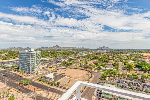 a view of a chairs and table in the patio
