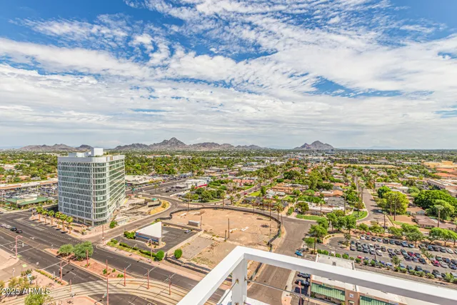 a view of a chairs and table in the patio