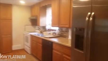 12933 Burt Road Memphis, MI 48041 - Photo 13 of 22 lots of space for large refrigerator, abundant cabinets and pantry storage