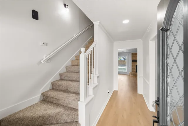a view of a hallway with staircase