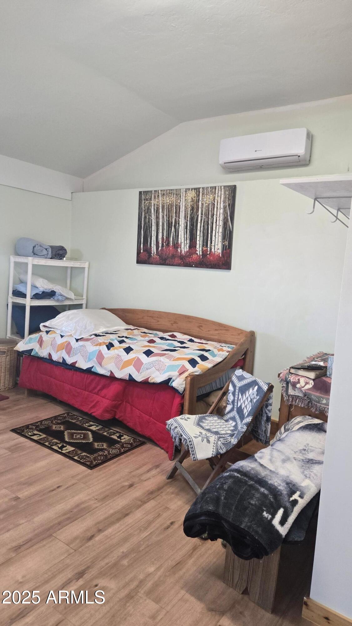 1565 Pumpkin Patch Road Heber, AZ 85928 - Photo 9 of 10 a bedroom with a bed and a dresser