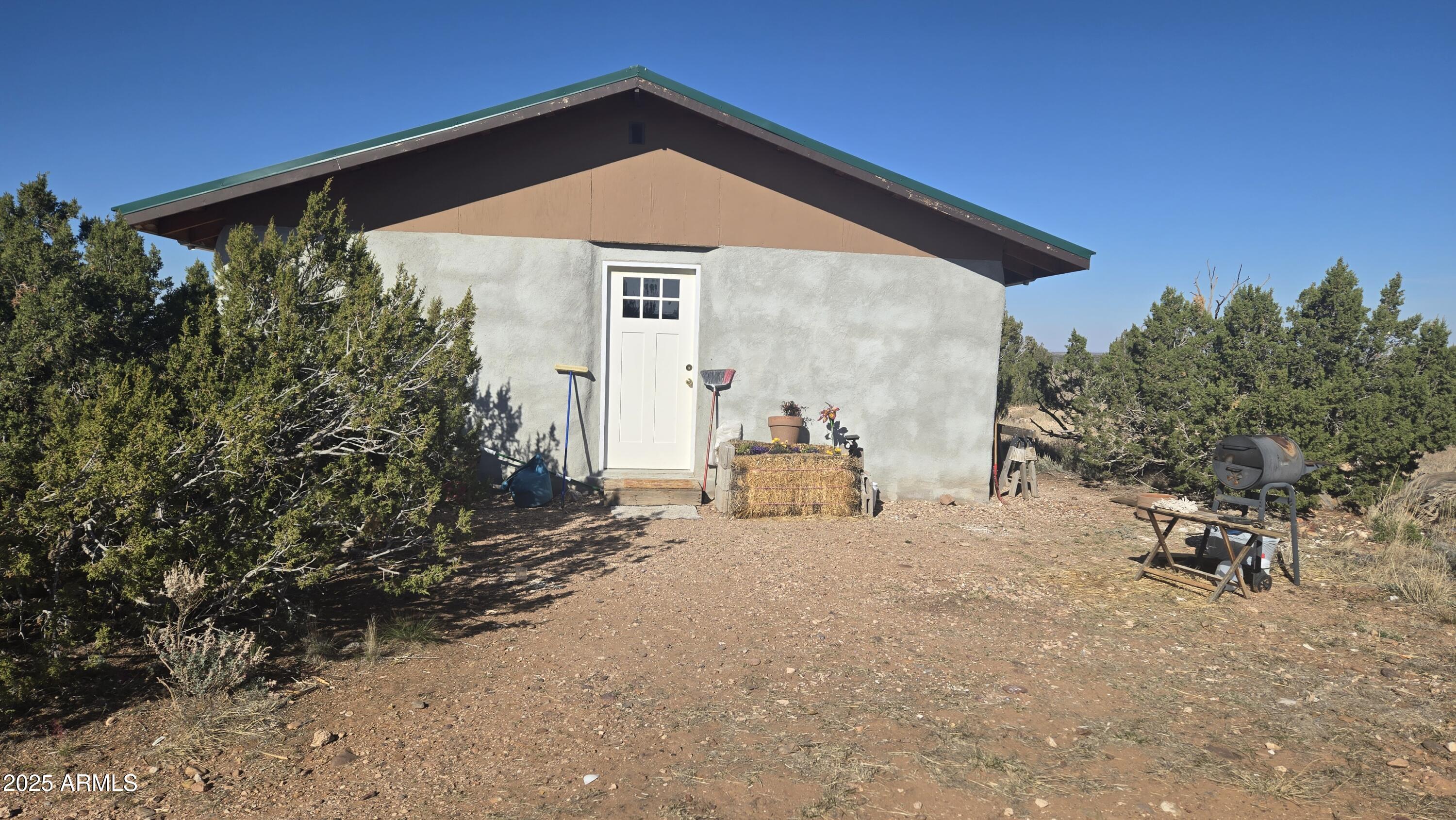 1565 Pumpkin Patch Road Heber, AZ 85928 - Photo 10 of 10 a front view of a house with a yard