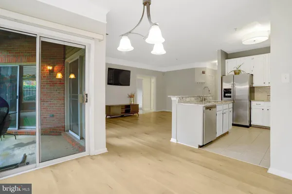 a view of a kitchen with furniture and a fireplace