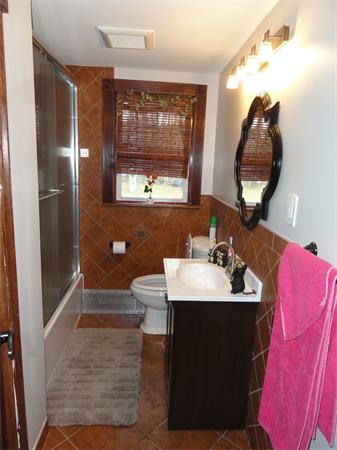 12 Weathervane Road Billerica, MA 01821 - Photo 14 of 30 a bathroom with a sink vanity and a mirror