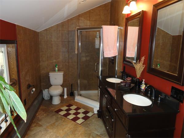 12 Weathervane Road Billerica, MA 01821 - Photo 20 of 30 a bathroom with a sink toilet and shower