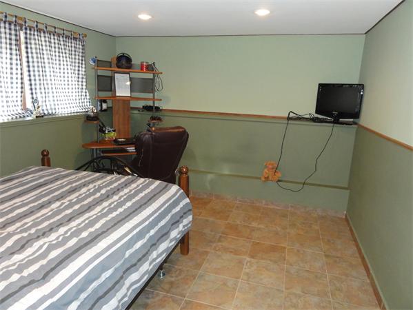 12 Weathervane Road Billerica, MA 01821 - Photo 25 of 30 a bedroom with a bed and cabinets