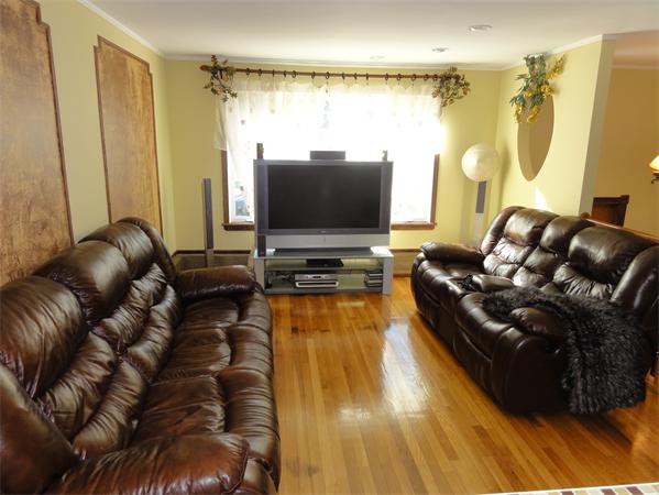 12 Weathervane Road Billerica, MA 01821 - Photo 9 of 30 a living room with furniture and a flat screen tv