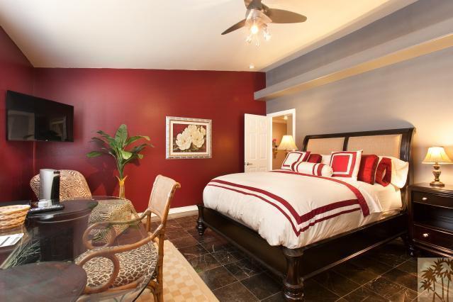 68130 Perlita Road Cathedral City, CA 92234 - Photo 12 of 19 a bedroom with bed and a flat screen tv
