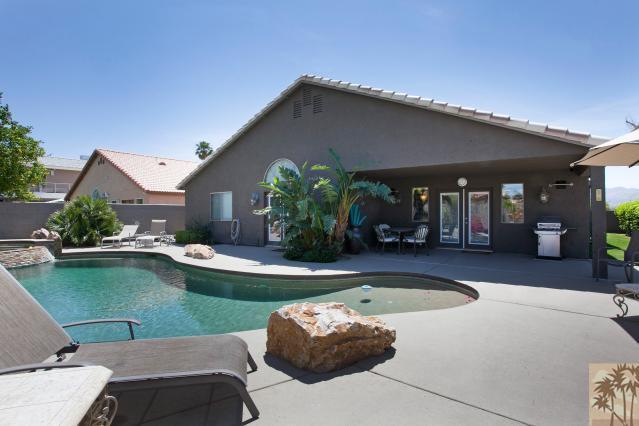 68130 Perlita Road Cathedral City, CA 92234 - Photo 18 of 19 a view of a house with swimming pool and sitting area