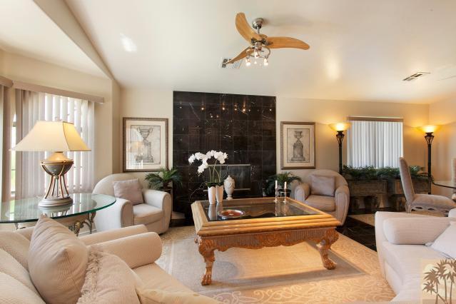 68130 Perlita Road Cathedral City, CA 92234 - Photo 3 of 19 a living room with furniture and a large window