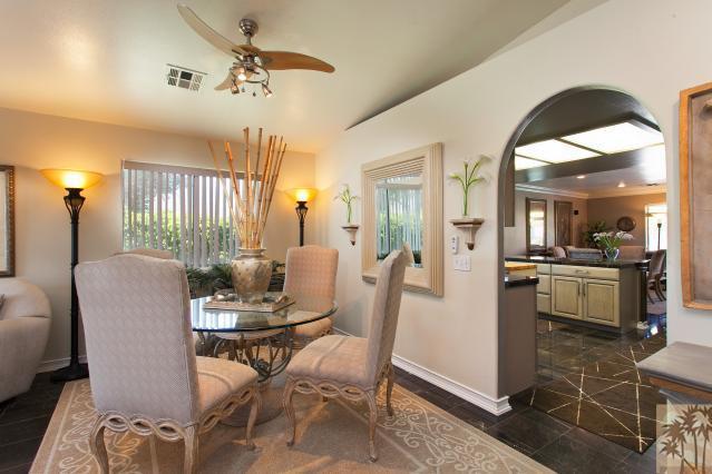 68130 Perlita Road Cathedral City, CA 92234 - Photo 4 of 19 a view of a dining room with furniture and a chandelier