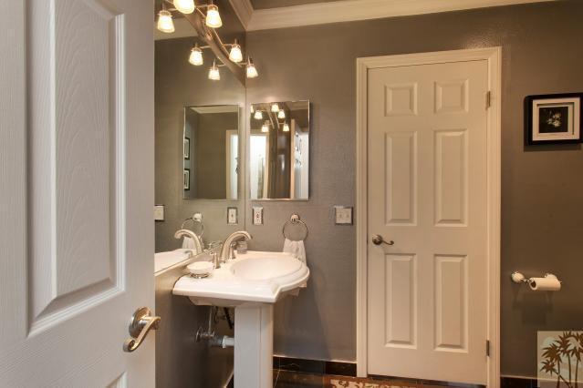 68130 Perlita Road Cathedral City, CA 92234 - Photo 9 of 19 a bathroom with a sink and a mirror
