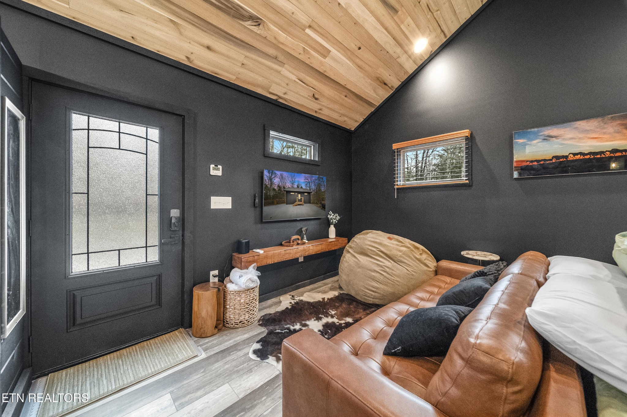 1079 Shell Mountain Road Sevierville, TN 37876 - Photo 20 of 29 a bedroom with furniture and window